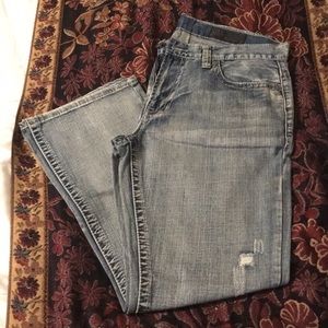 MENS JEANS WITH DISTRESSED DETAIL